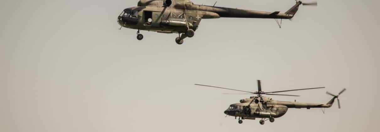 military helicopters flying