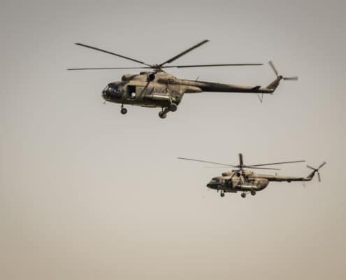 military helicopters flying