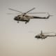 military helicopters flying